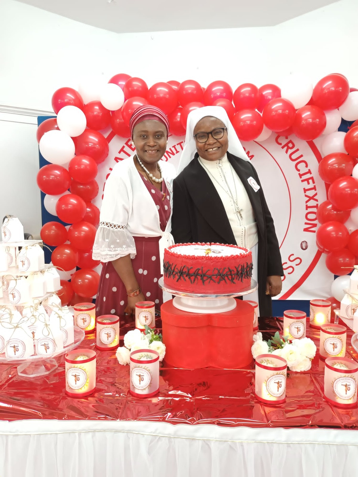 Apostolate celebration with cake and branded candles